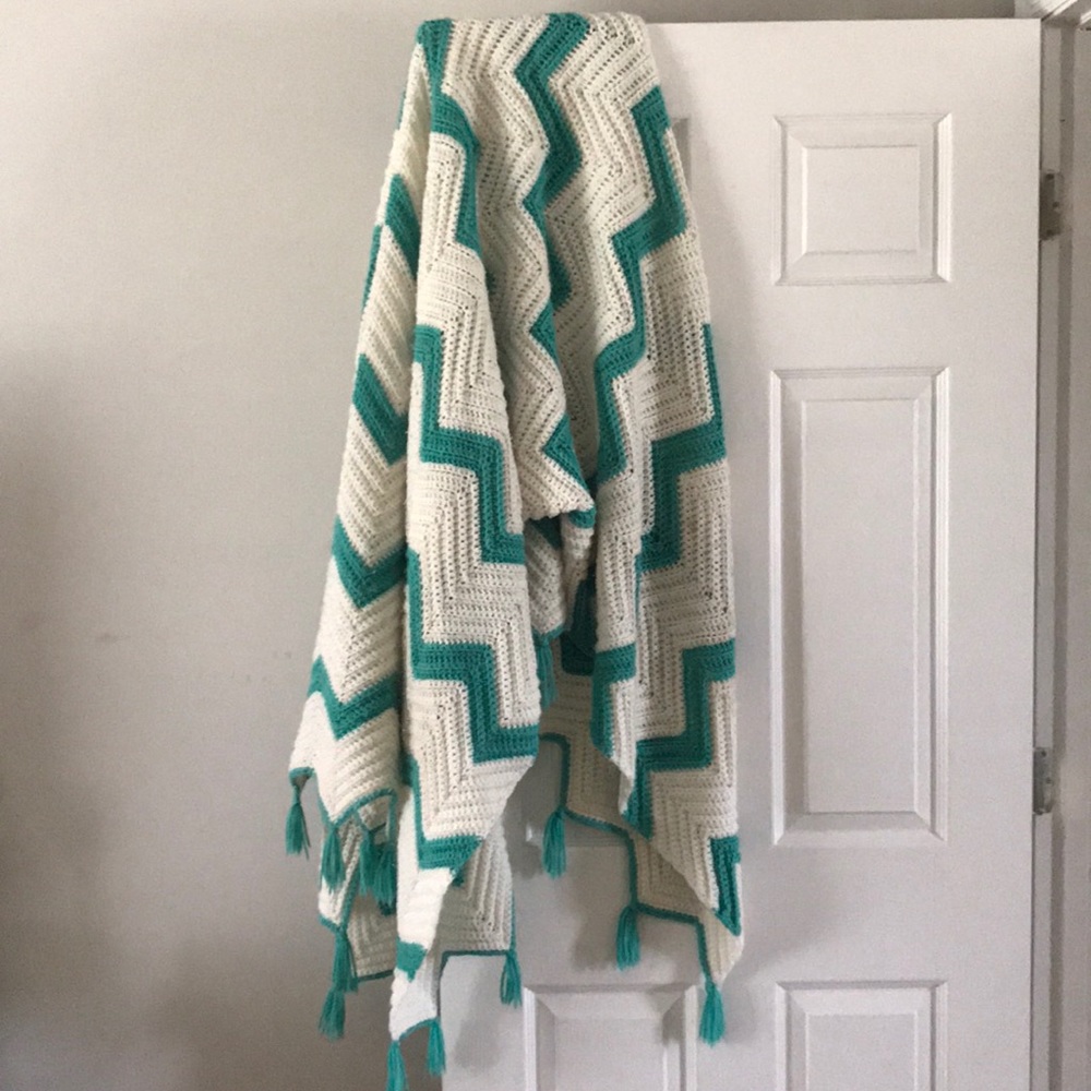 Large crocheted throw blanket with tassels